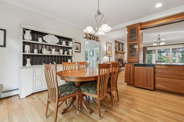 Chandelier, Dining room, Fireplace, Interior, Pendant Lights, Recessed Lighting, Wood Texture Flooring