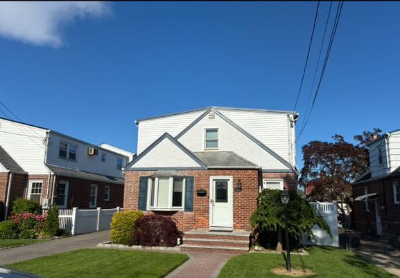 Exterior, Facade, Brick Facade, Cape Cod