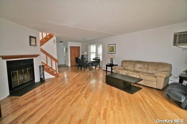 Dining room, Fireplace, Interior, Living room, Piano, Wood Texture Flooring