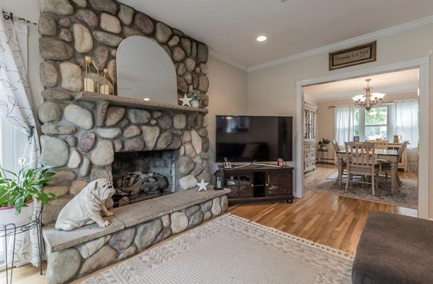 Chandelier, Dining room, Fireplace, Interior, Recessed Lighting, Stone Walls, Wood Texture Flooring