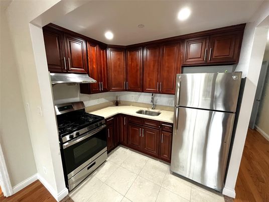 Interior, Kitchen, Recessed Lighting, Stainless Steel Appliances, Wood Texture Flooring