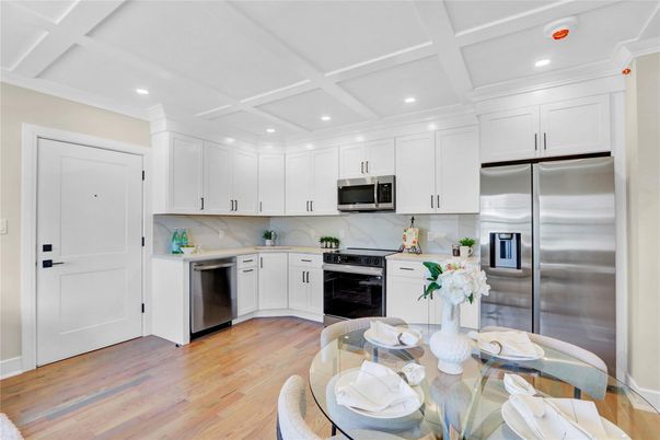 Dining room, Interior, Kitchen, Recessed Lighting, Stainless Steel Appliances, Wood Texture Flooring