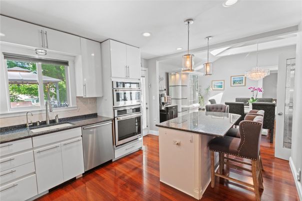 Chandelier, Interior, Kitchen, Pendant Lights, Recessed Lighting, Stainless Steel Appliances, Wood Texture Flooring