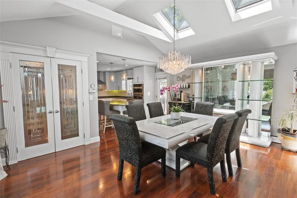 Chandelier, Dining room, Interior, Kitchen, Stainless Steel Appliances, Wood Texture Flooring