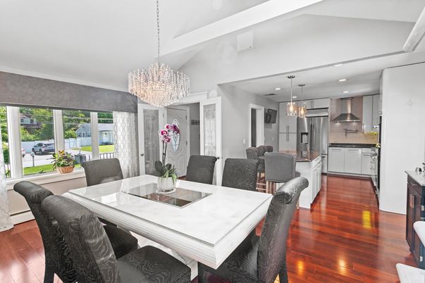 Chandelier, Dining room, Interior, Kitchen, Pendant Lights, Recessed Lighting, Stainless Steel Appliances, Wood Texture Flooring