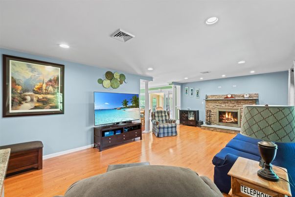 Fireplace, Interior, Living room, Recessed Lighting, Wood Texture Flooring