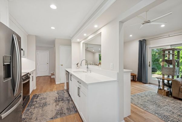 Interior, Kitchen, Recessed Lighting, Stainless Steel Appliances, Wood Texture Flooring