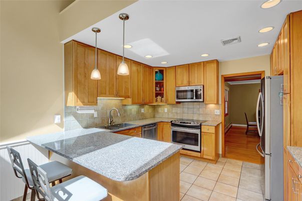 Interior, Kitchen, Pendant Lights, Recessed Lighting, Stainless Steel Appliances, Wood Texture Flooring