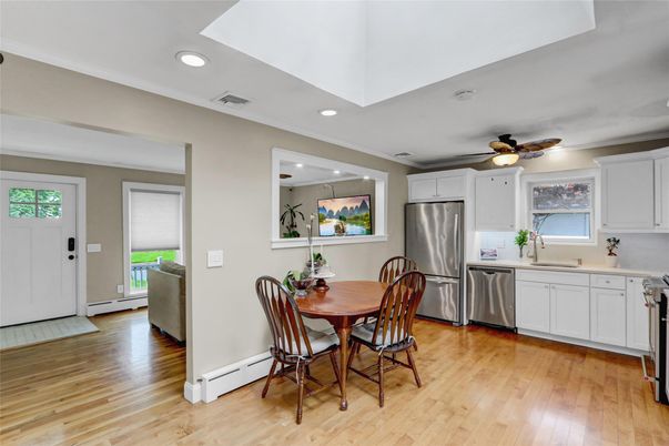 Dining room, Interior, Kitchen, Recessed Lighting, Stainless Steel Appliances, Wood Texture Flooring