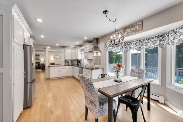 Chandelier, Dining room, Interior, Kitchen, Pendant Lights, Recessed Lighting, Stainless Steel Appliances, Wood Texture Flooring