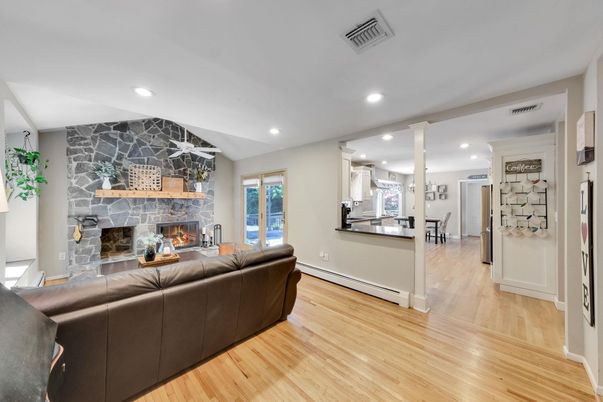 Fireplace, Interior, Living room, Recessed Lighting, Wood Texture Flooring