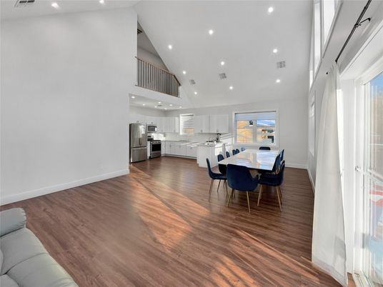 Dining room, Interior, Kitchen, Recessed Lighting, Stainless Steel Appliances, Wood Texture Flooring