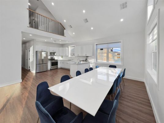 Dining room, Interior, Kitchen, Recessed Lighting, Stainless Steel Appliances, Wood Texture Flooring