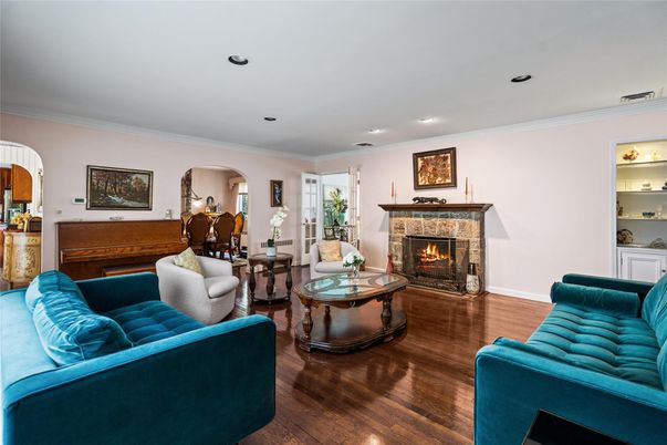 Dining room, Fireplace, Interior, Living room, Recessed Lighting, Wood Texture Flooring