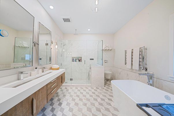 Bathroom, Dual Sink Vanities, Free Standing Baths, Glass Shower, Interior, Marble Walls, Recessed Lighting