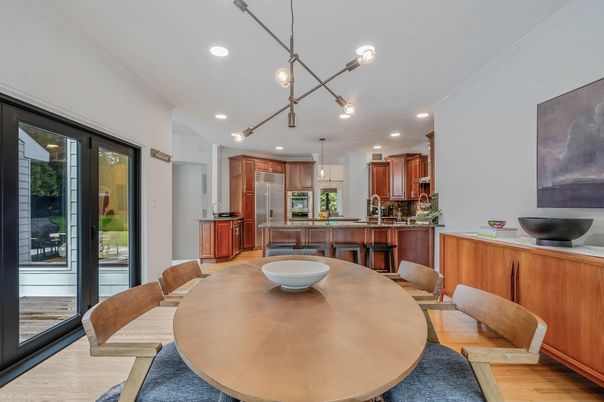 Dining room, Interior, Kitchen, Pendant Lights, Recessed Lighting, Stainless Steel Appliances, Wood Texture Flooring