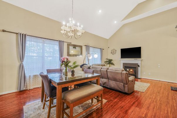 Chandelier, Dining room, Fireplace, Interior, Living room, Recessed Lighting, Wood Texture Flooring