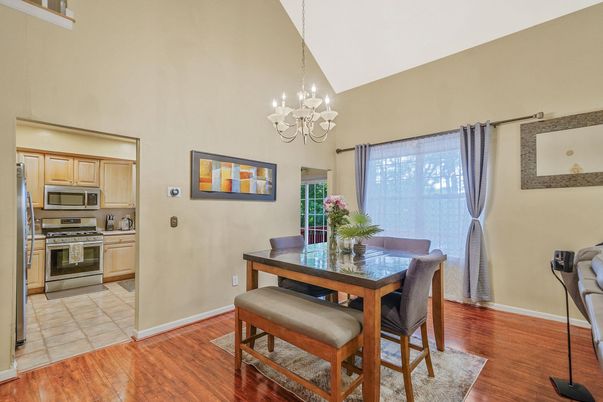 Chandelier, Dining room, Interior, Kitchen, Stainless Steel Appliances, Wood Texture Flooring