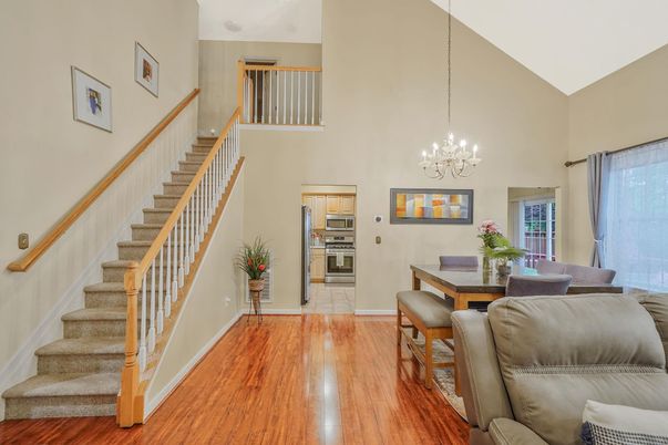 Chandelier, Dining room, Interior, Kitchen, Pendant Lights, Stainless Steel Appliances, Wood Texture Flooring