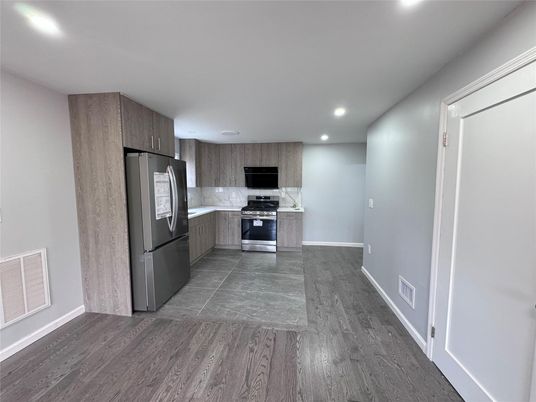 Interior, Kitchen, Recessed Lighting, Stainless Steel Appliances, Wood Texture Flooring