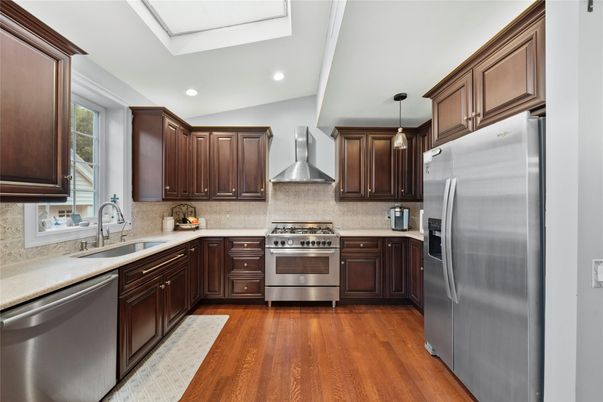 Interior, Kitchen, Pendant Lights, Recessed Lighting, Stainless Steel Appliances, Wood Texture Flooring