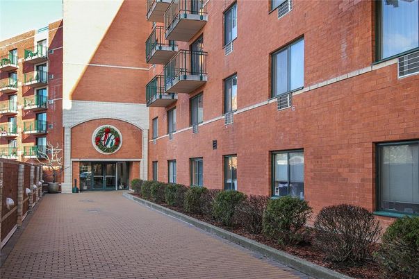 Exterior, Facade, Brick Facade, Condo Building