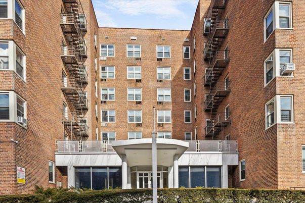 Exterior, Facade, Brick Facade, Condo Building