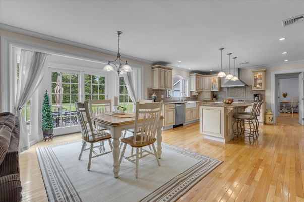 Dining room, Interior, Kitchen, Pendant Lights, Recessed Lighting, Stainless Steel Appliances, Wood Texture Flooring