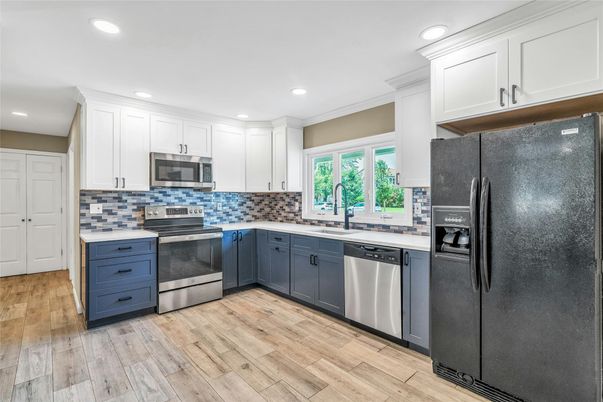 Interior, Kitchen, Recessed Lighting, Stainless Steel Appliances, Wood Texture Flooring
