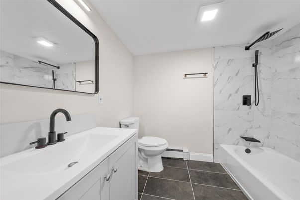 Bathroom, Dual Sink Vanities, Interior, Marble Walls, Recessed Lighting