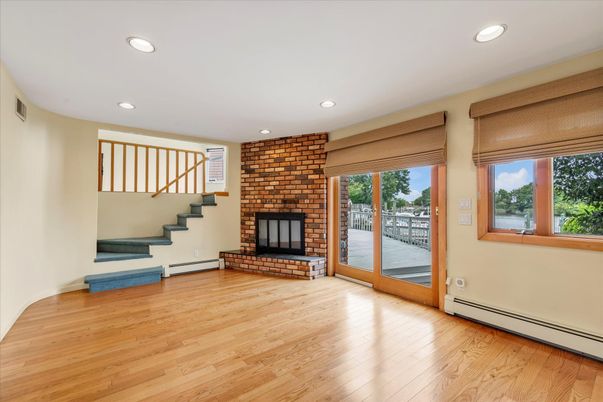 Fireplace, Interior, Recessed Lighting, Stone Walls, Wood Texture Flooring
