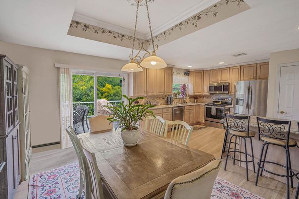Dining room, Interior, Kitchen, Pendant Lights, Recessed Lighting, Stainless Steel Appliances, Wood Texture Flooring