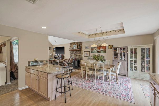 Dining room, Fireplace, Interior, Pendant Lights, Recessed Lighting, Wood Texture Flooring