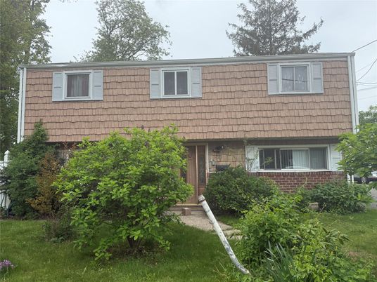 Exterior, Facade, Brick Facade, Raised Ranch