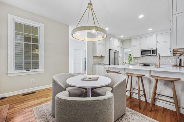 Dining room, Interior, Kitchen, Pendant Lights, Recessed Lighting, Stainless Steel Appliances, Wood Texture Flooring
