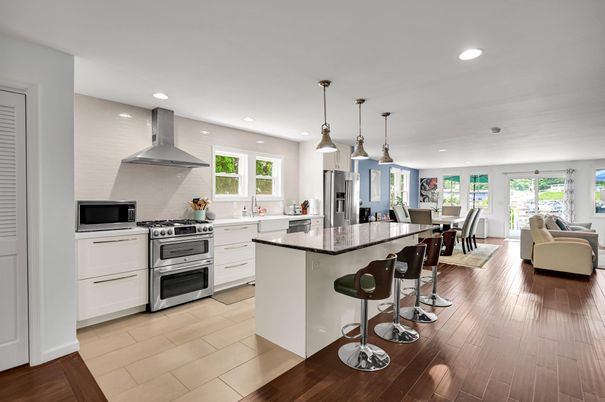 Dining room, Interior, Kitchen, Living room, Pendant Lights, Recessed Lighting, Stainless Steel Appliances, Wood Texture Flooring