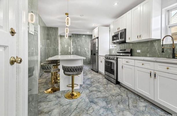 Interior, Kitchen, Marble, Marble Walls, Pendant Lights, Recessed Lighting, Stainless Steel Appliances