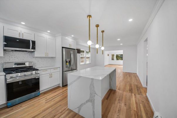 Interior, Kitchen, Pendant Lights, Recessed Lighting, Stainless Steel Appliances, Wood Texture Flooring