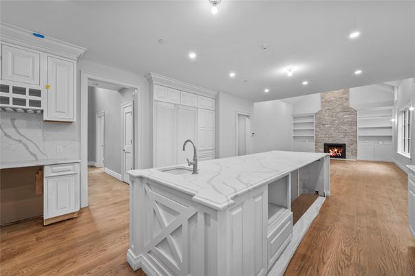 Fireplace, Interior, Kitchen, Recessed Lighting, Wood Texture Flooring