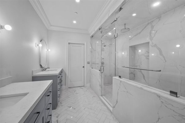Bathroom, Dual Sink Vanities, Glass Shower, Interior, Marble, Marble Walls, Recessed Lighting