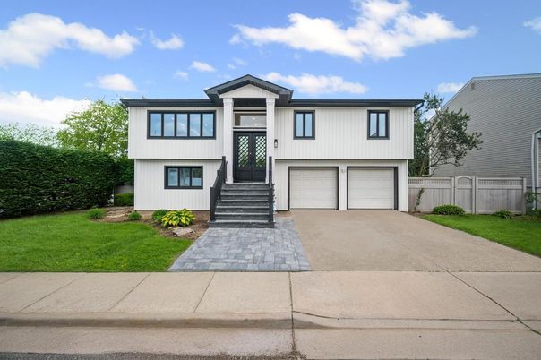 Attached, Exterior, Facade, Raised Ranch