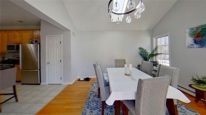 Chandelier, Dining room, Interior, Kitchen, Stainless Steel Appliances, Wood Texture Flooring