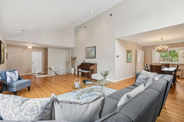 Chandelier, Dining room, Interior, Living room, Piano, Recessed Lighting, Wood Texture Flooring
