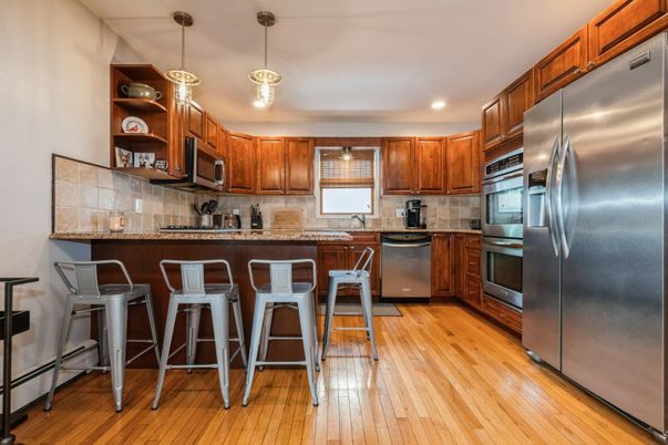 Interior, Kitchen, Pendant Lights, Recessed Lighting, Stainless Steel Appliances, Wood Texture Flooring