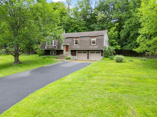 Attached, Backyard, Exterior, Facade, Brick Facade, Raised Ranch