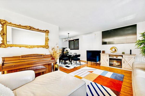 Chandelier, Dining room, Fireplace, Interior, Living room, Pendant Lights, Piano, Wood Texture Flooring