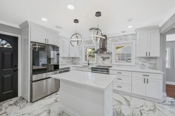 Interior, Kitchen, Marble, Marble Walls, Pendant Lights, Recessed Lighting, Stainless Steel Appliances