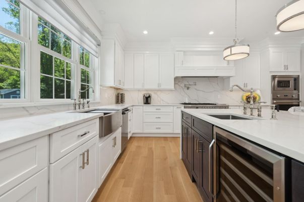 Interior, Kitchen, Marble Walls, Pendant Lights, Recessed Lighting, Stainless Steel Appliances, Wood Texture Flooring
