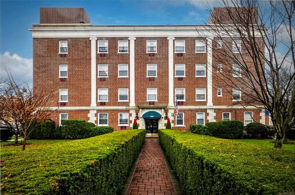 Exterior, Facade, Brick Facade, Condo Building
