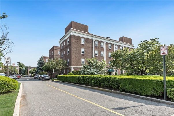 Exterior, Facade, Brick Facade, Condo Building